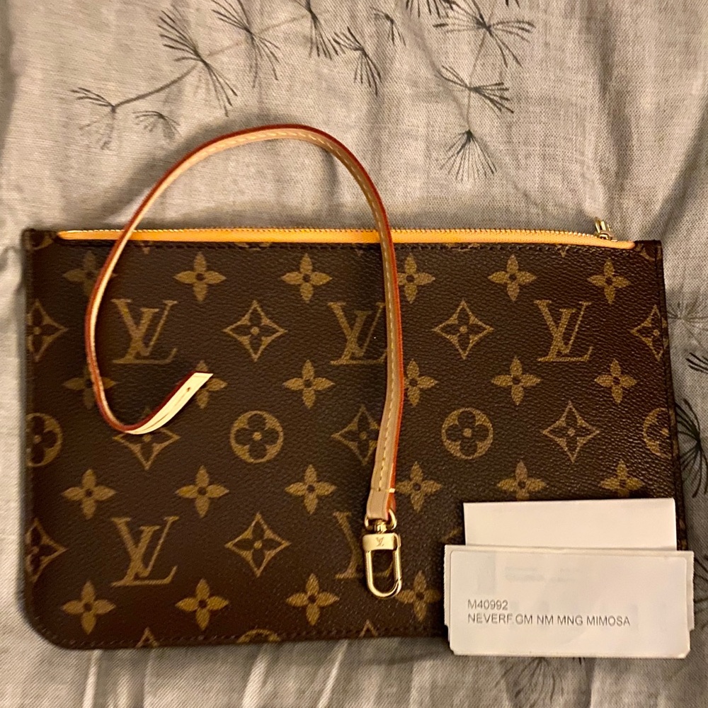 Brand New *Rare* Mimosa Pouch from Neverfull GM